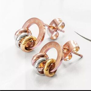 Rose gold plated fashionista designer-inspired post earrings. NEW.